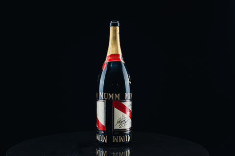 1050 - Mumm Podium Bottle Signed from Michael Schumacher