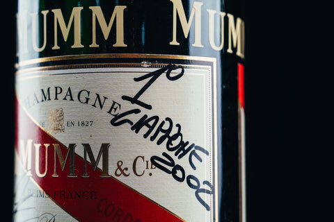 1050 - Mumm Podium Bottle Signed from Michael Schumacher