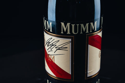 1053 - Mumm Podium Bottle Signed from Michael Schumacher