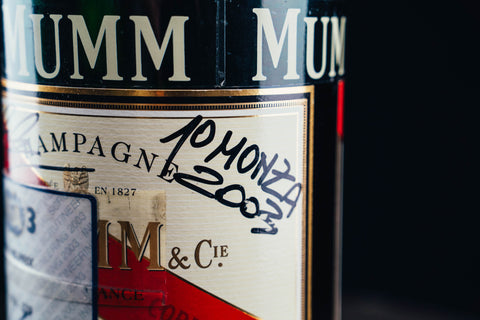 1052 - Mumm Podium Bottle Signed from Michael Schumacher