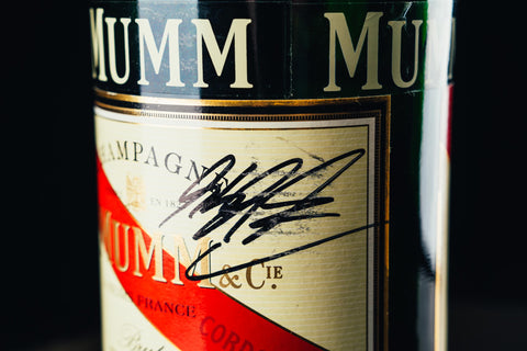 1049 - Mumm Podium Bottle Signed from Michael Schumacher
