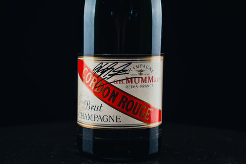 1051 - Mumm Podium Bottle Signed from Michael Schumacher