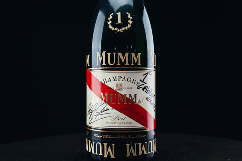 1050 - Mumm Podium Bottle Signed from Michael Schumacher
