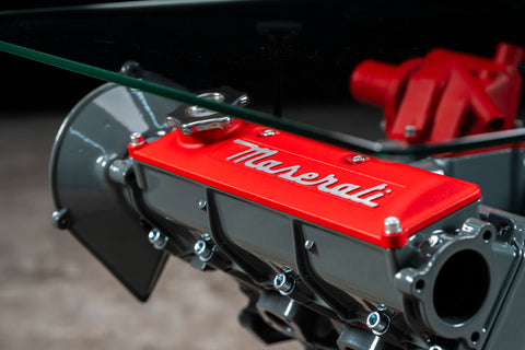Maserati engine table with glass base