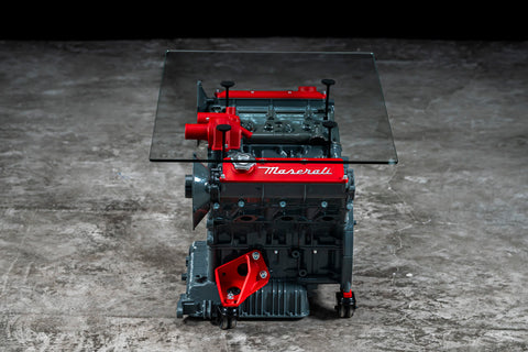 Maserati engine table with glass base