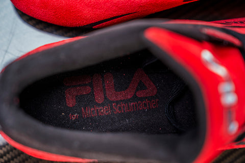 Exclusive Michael Schumacher FILA signed shoes, perfect for collectors. / Scarpe esclusive FILA firmate Schumacher, perfette per collezionisti