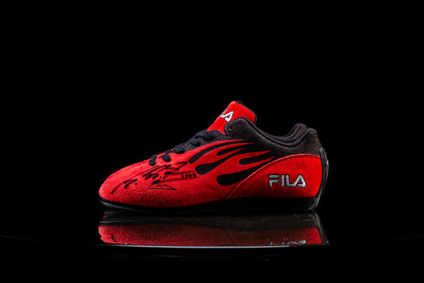 Fila promotional shoes signed by Michael Schumacher. / Scarpe FILA firmate da Michael Schumacher