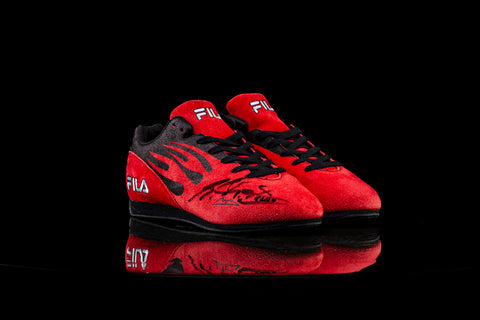 Autographed Michael Schumacher FILA racing shoes. / Scarpe da corsa FILA autografate da Schumacher