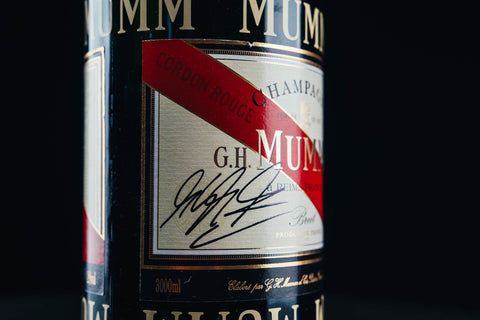 1050 - Mumm Podium Bottle Signed from Michael Schumacher