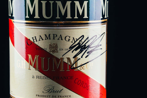 1049 - Mumm Podium Bottle Signed from Michael Schumacher