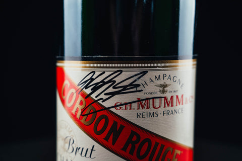 1051 - Mumm Podium Bottle Signed from Michael Schumacher