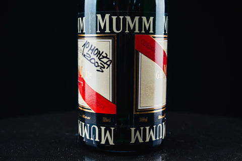 1052 - Mumm Podium Bottle Signed from Michael Schumacher