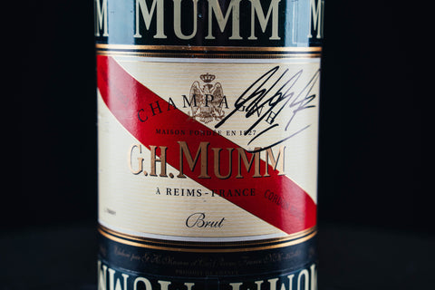 1053 - Mumm Podium Bottle Signed from Michael Schumacher