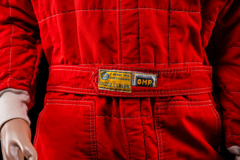 Historic Ferrari race suit from Gerhard Berger’s F1 career. / Tuta storica Ferrari da gara della carriera F1 di Gerhard Berger