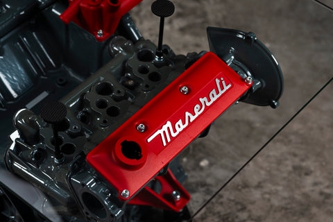 Maserati engine table with glass base