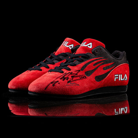 Michael Schumacher FILA signed shoes, racing memorabilia. / Scarpe FILA autografate da Michael Schumacher, memorabilia da corsa